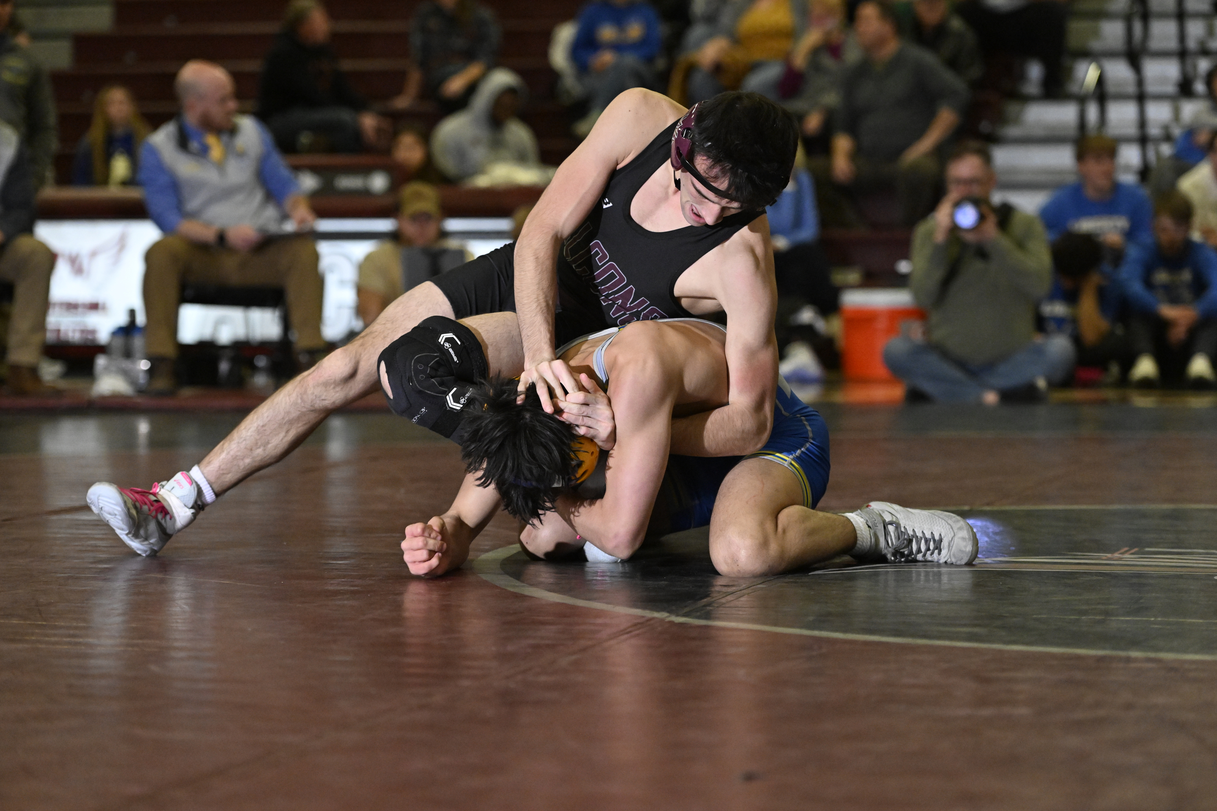 Winters Mill's Brody Lockwood works on top of Liberty's Keelan...