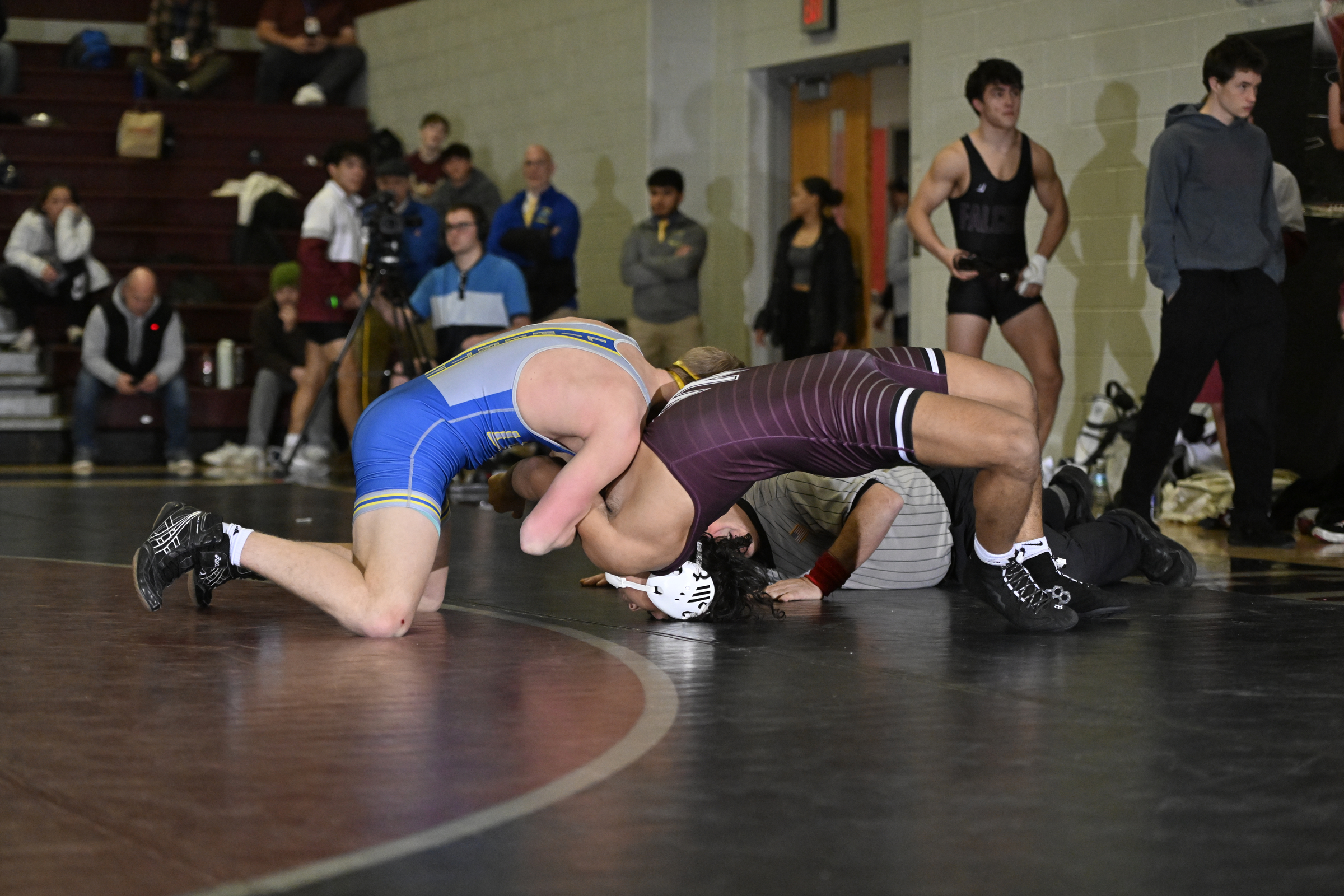Liberty's Dylan Ohler tries to get back points on Winters...