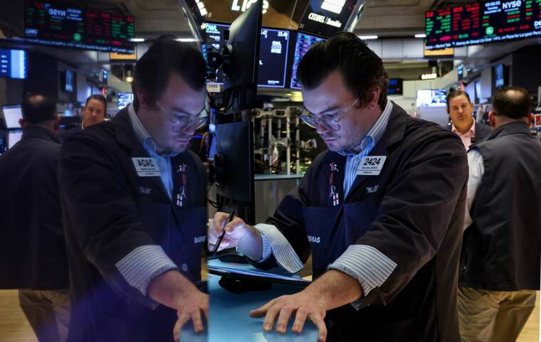 Wall Street ends lower as tariffs loom
