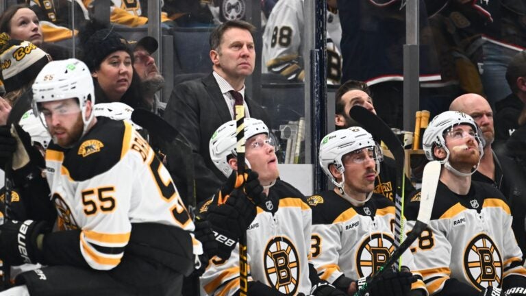 COLUMBUS, OHIO - DECEMBER 27: Interim head coach Joe Sacco of the Boston Bruins awaits a face-off following a Columbus Blue Jackets goal during the third period of a game against the Columbus Blue Jackets at Nationwide Arena on December 27, 2024 in Columbus, Ohio.
