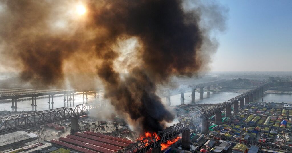 Fire tears through tents at India’s mega Hindu festival but causes no injuries