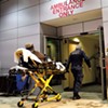 Paramedic Stephan Bryant bringing a patient into Brattleboro Memorial Hospital's emergency room