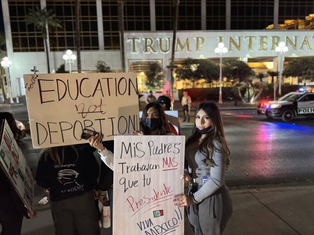 High school students Karen Pina, 14, and Yareli Nunoz, 15, protest President Donald Trump's imm ...