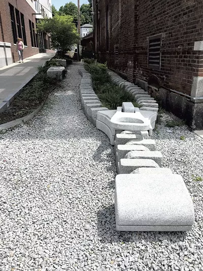 "Unzipping the Earth," a granite sculpture by Chris Miller, in downtown Barre - FILE: PAMELA POLSTON ©️ SEVEN DAYS