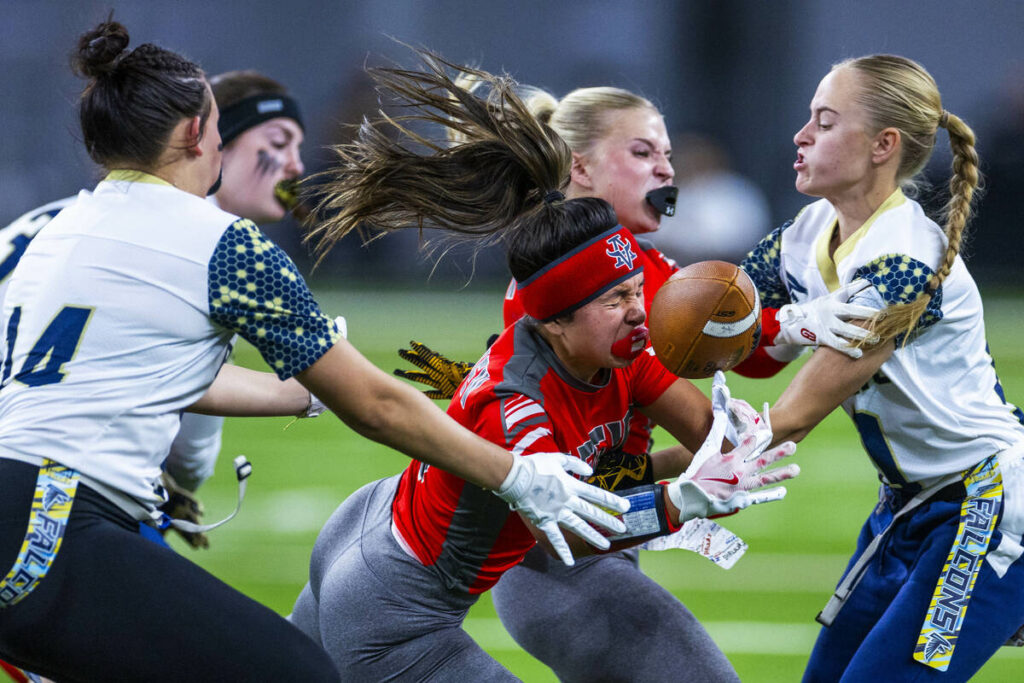 Arbor View running back Danielle Morales (3) loses the ball after a run as Foothill defensive b ...