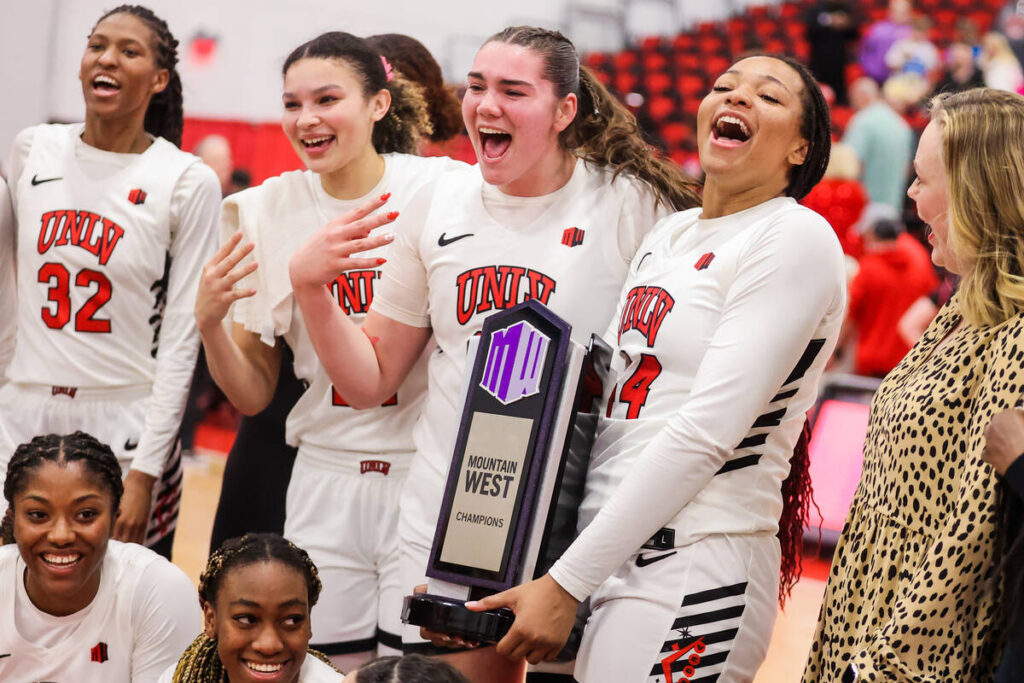 The Lady Rebels celebrate earning their fourth straight Mountain West title after an NCAA women ...