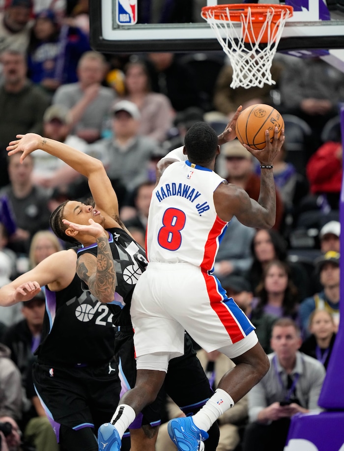 (Francisco Kjolseth  | The Salt Lake Tribune) Utah Jazz guard Keyonte George (3) is overtaken by Detroit Pistons forward Tim Hardaway Jr. (8) as the Utah Jazz host the Detroit Pistons during an NBA basketball game, Monday, March 3, 2025.