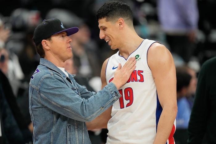 (Francisco Kjolseth  | The Salt Lake Tribune) Utah Jazz owner Ryan Smith greets former Jazz player Detroit Pistons forward Simone Fontecchio (19) following a game between the Utah Jazz and the Detroit Pistons, Monday, March 3, 2025.