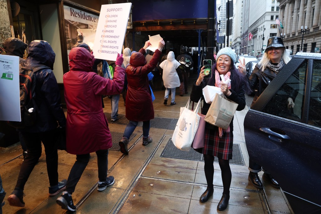 Hundreds gather in Daley Plaza Tuesday to protest Trump