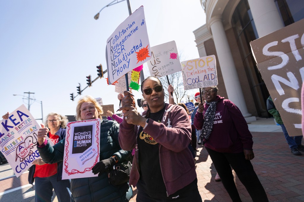 International Women’s Day protest draws roughly 100 people to Virginia Beach’s Town Center – The Virginian-Pilot