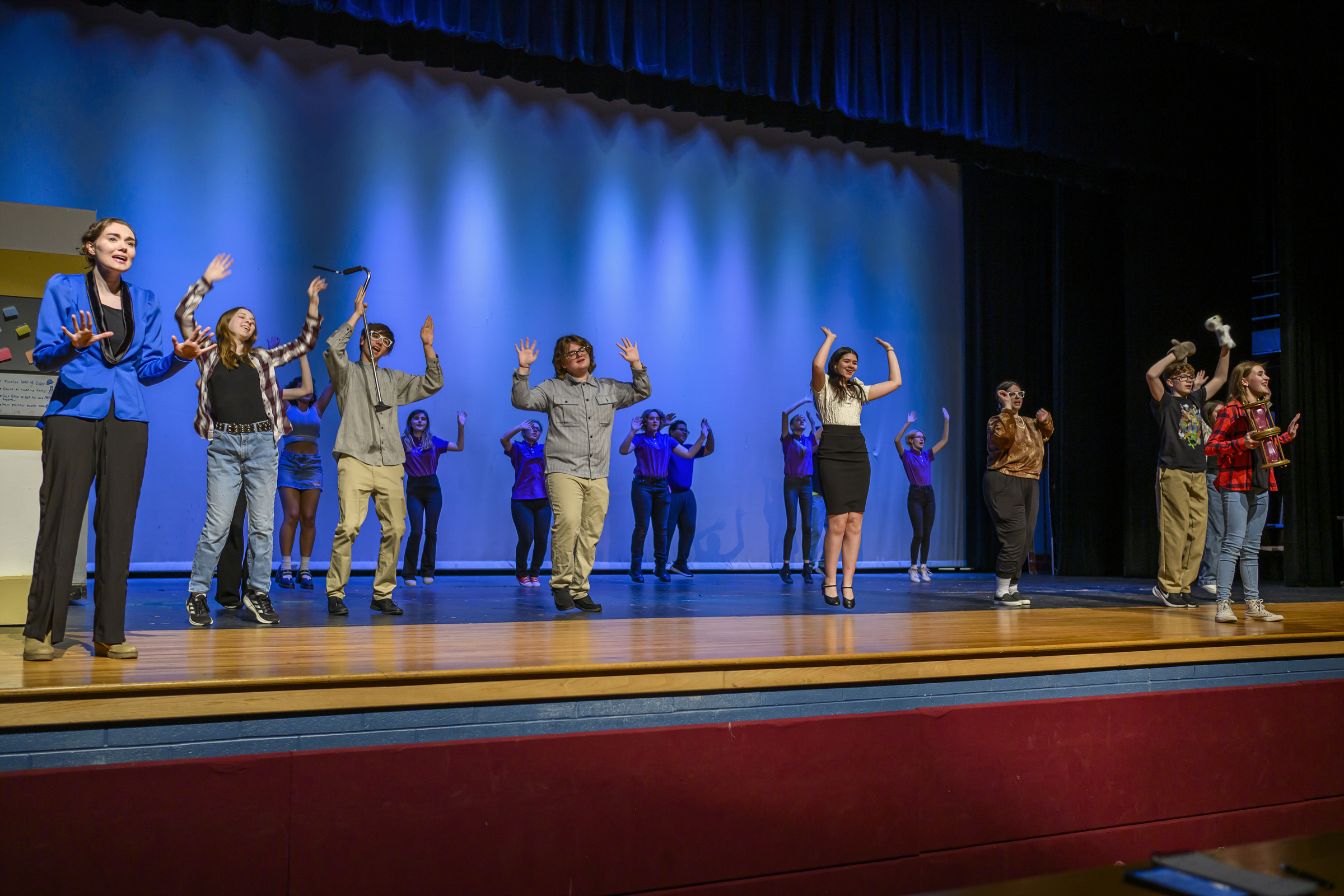 The cast dances and sings during a dress rehearsal of Freaky Friday at Winters Mill High School.(Thomas Walker/Freelance)