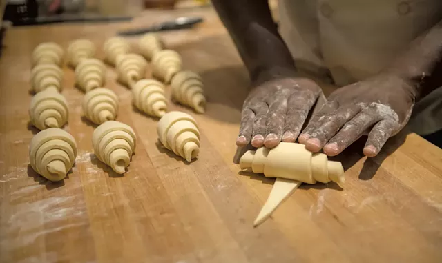 Chris Johnson rolling croissants in 2022 - FILE: DARIA BISHOP