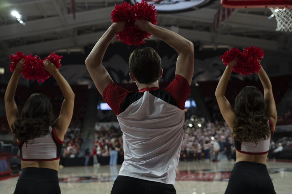 Ryan Cawley dances with the NC State Dance Team Feb. 26, 2025 at Reynolds Coliseum. Ryan Cawley performs with the N.C. State Dance Team. Photo by Chase Cofield for The Assembly.