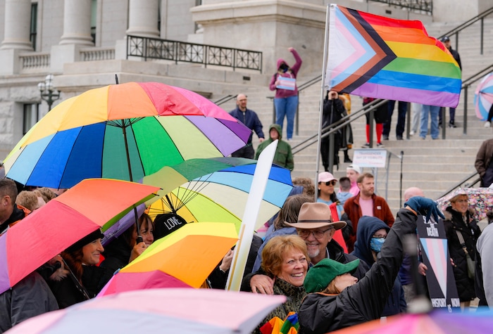 (Francisco Kjolseth  | The Salt Lake Tribune) Hundreds of people show up at the Utah State Capitol on Mar. 29, 2025 to fly the largest transgender pride flag in Utah. The unveiling of the flag is part of celebrations for Transgender Day of Visibility, hosted by local nonprofits Utah Pride Center and The Glitter Foundation.
