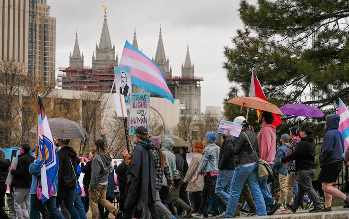 (Francisco Kjolseth  | The Salt Lake Tribune) Hundreds of people show up at the Utah State Capitol on Mar. 29, 2025 to fly the largest transgender pride flag in Utah. The unveiling of the flag is part of celebrations for Transgender Day of Visibility, hosted by local nonprofits Utah Pride Center and The Glitter Foundation.