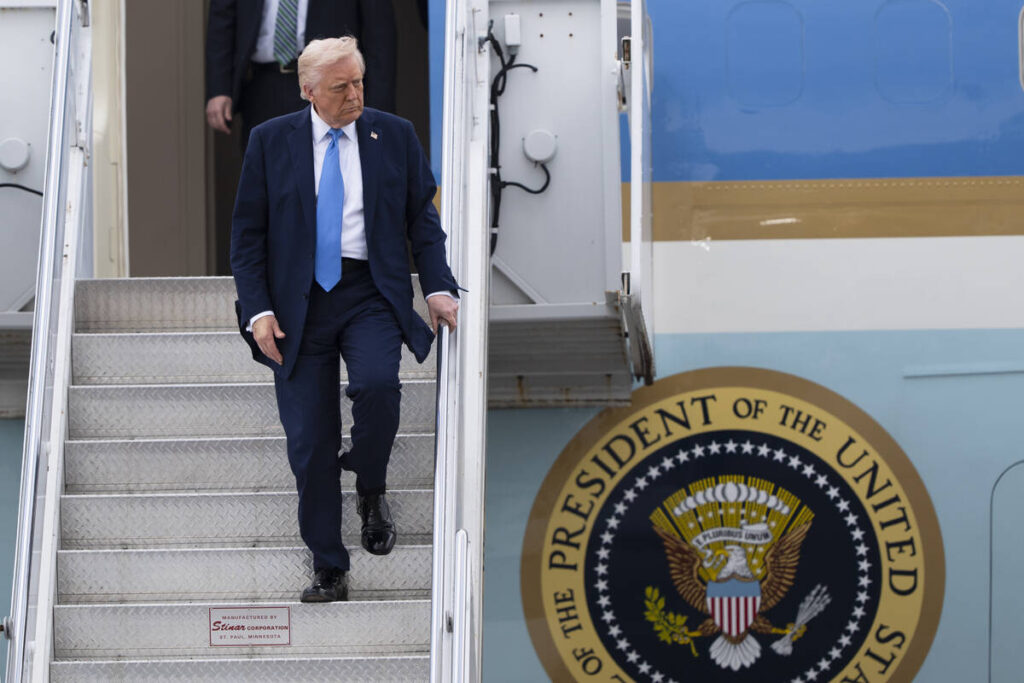 President Donald Trump arrives on Air Force One at Palm Beach International Airport, Friday, Ma ...
