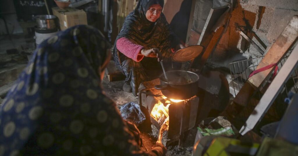 Loss, worry and prayers mark Ramadan start as cease-fire holds in Gaza