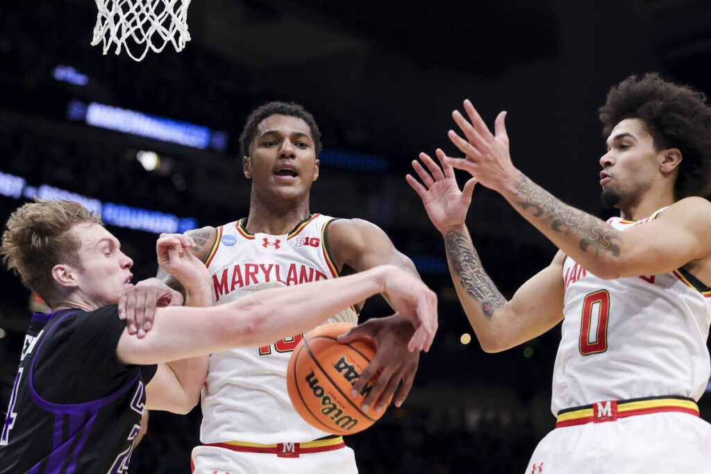 Maryland forward Julian Reese, center, guard Ja'Kobi Gillespie, right, and Grand Canyon forward ...