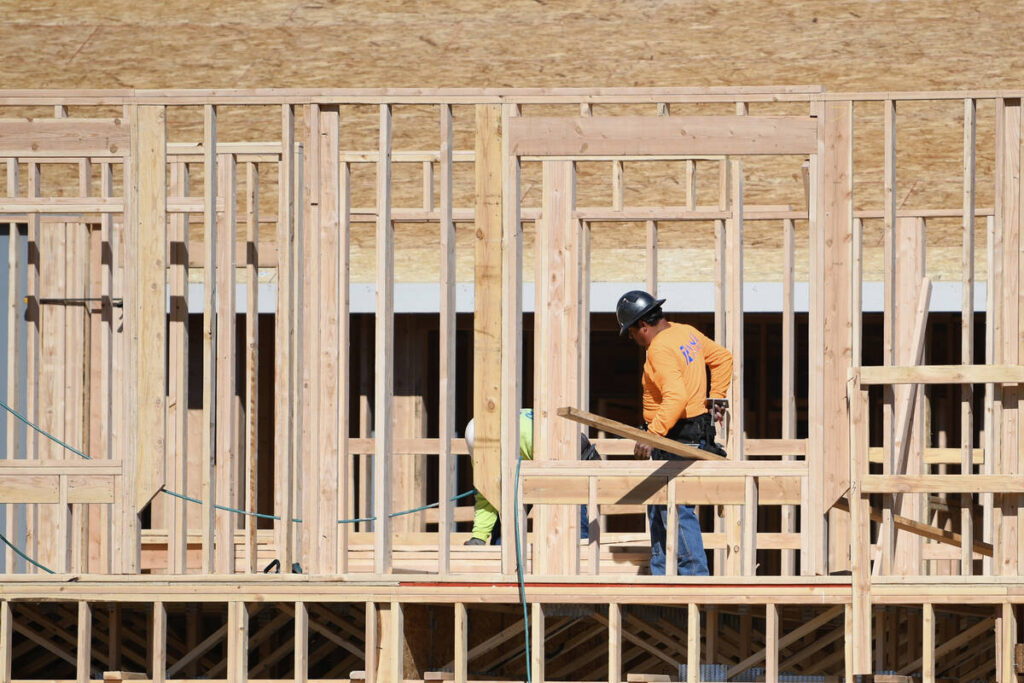 Houses are seen under construction on Gentle Swan Street in D.R. Horton’s Symmetry devel ...