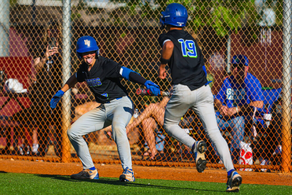 Green Valley catcher Brady Burns (7) celebrates during a high school baseball game between Gree ...
