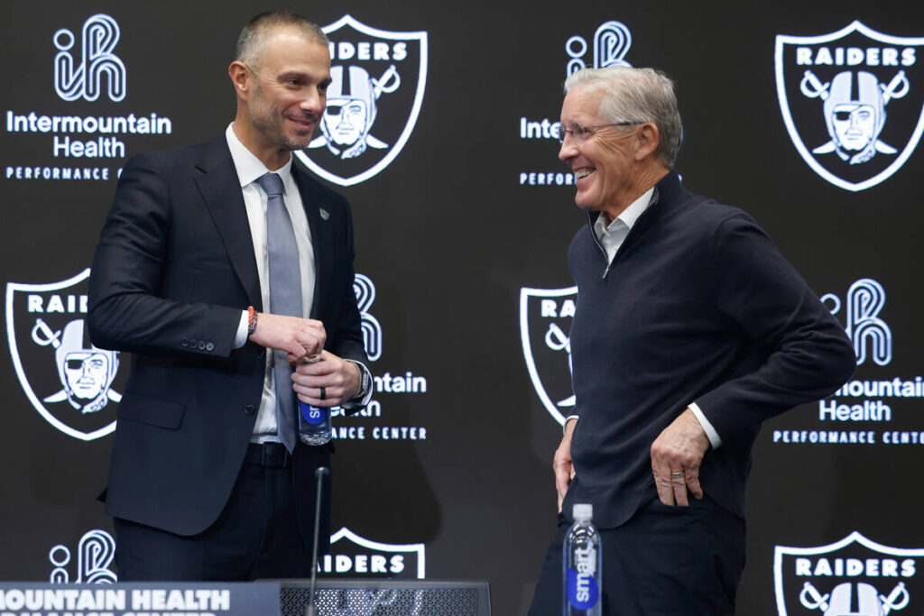 The new Raiders general manager John Spytek, left, and new head coach Pete Carroll share laught ...