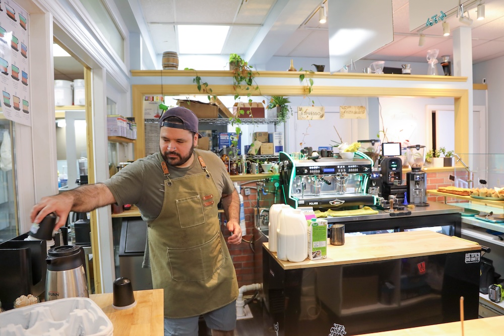 Andy Olivares, co-owner of Whisk & Rye, is nervously watching federal policies as he makes plans for the coffee shop. Photo by Abigail Bromberger — The 9th Street Journal
