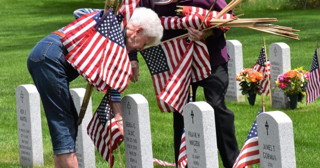 Flags for the fallen: Volunteers share their stories as they honor veterans | New Hampshire