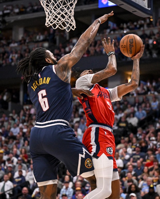 DeAndre Jordan (6) of the Denver Nuggets forces a miss...