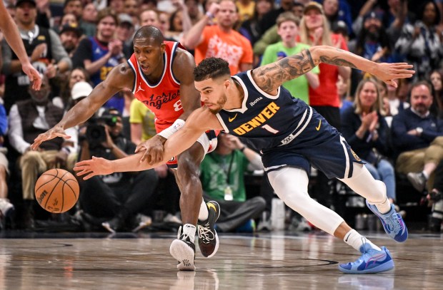 Michael Porter Jr. (1) of the Denver Nuggets and Kris...