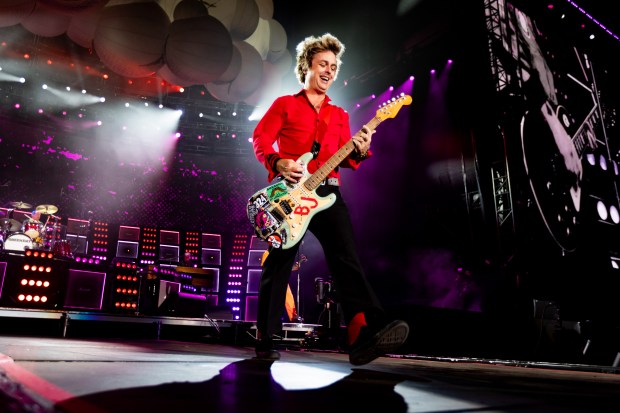 Billie Joe Armstrong of Green Day performs at Wrigley Field in Chicago on Aug. 13, 2024. (Tess Crowley/Chicago Tribune)