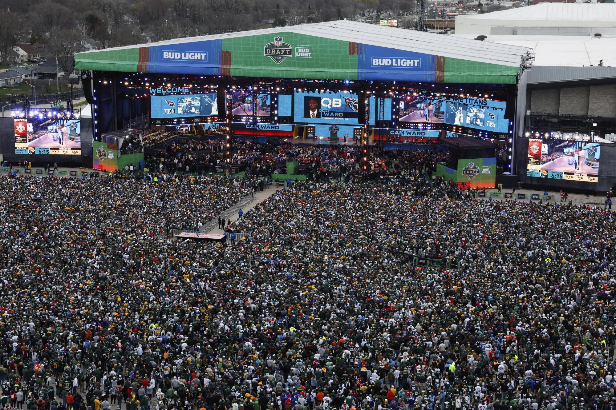 More than 200,000 fans attended the first round of the NFL draft outside Lambeau Field.