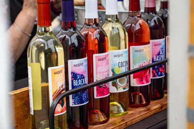 Misfit Winery offered samples of Peach Chardonnay, Blackberry Merlot, Dragonfruit Raspberry Shiraz, Coconut Lime Riesling, Watermelon White Merlot and Acai Rasberry Cabernet Sauvignon at the Westminster Wine Stroll on Main Street. (Karen Jackson/Freelance)
