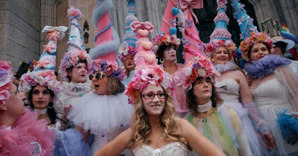 AP PHOTOS: Colorful hats and costumes light up annual NYC Easter Parade