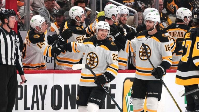 Boston Bruins' Fabian Lysell (23) returns to the bench after scoring during the second period of an NHL hockey game against the Pittsburgh Penguins in Pittsburgh, Sunday, April 13, 2025.