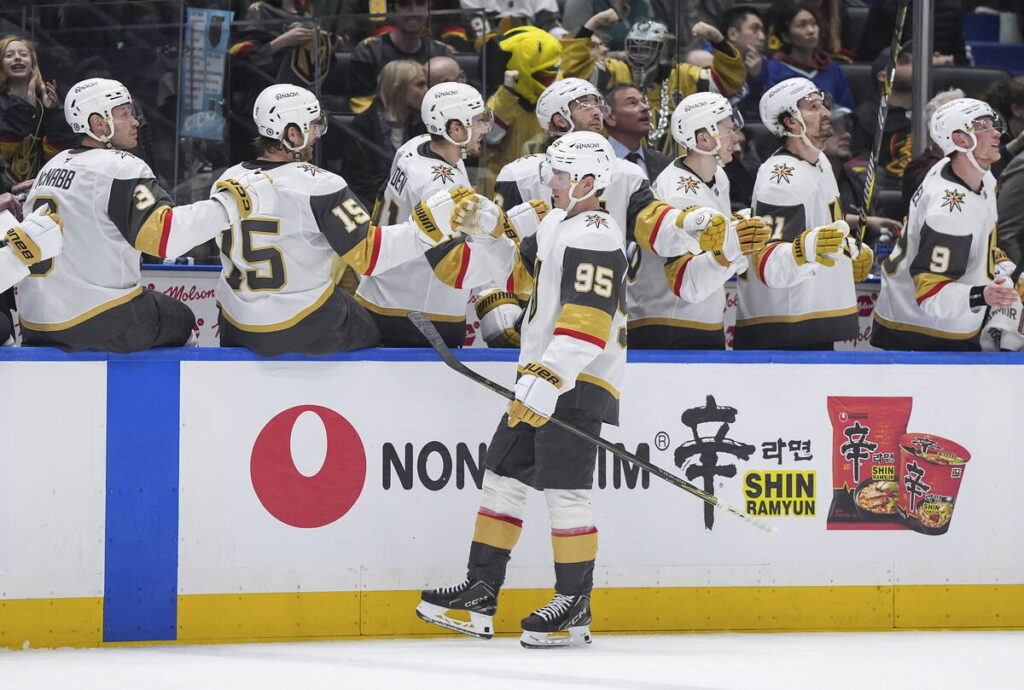 Vegas Golden Knights' Victor Olofsson (95) celebrates his goal against the Vancouver Canucks du ...