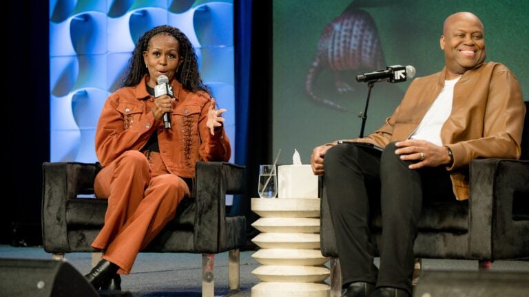 Michelle Obama and Craig Robinson speak on stage during IMO Live podcast 2025 SXSW Conference and Festival at Austin Convention Center on March 13, 2025 in Austin, Texas.