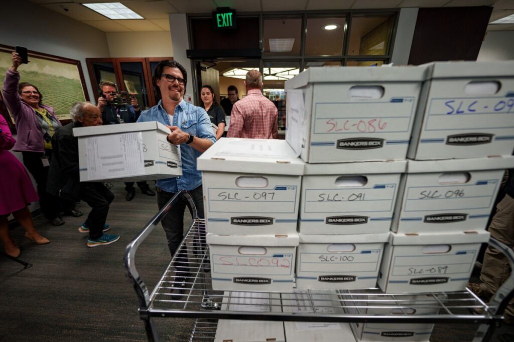 Organizers submit twice required signitures in repeal effort