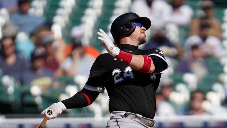 Chicago White Sox's Yasmani Grandal hits a solo home run against the Detroit Tigers in the fourth inning of a baseball game in Detroit, Monday, Sept. 27, 2021.