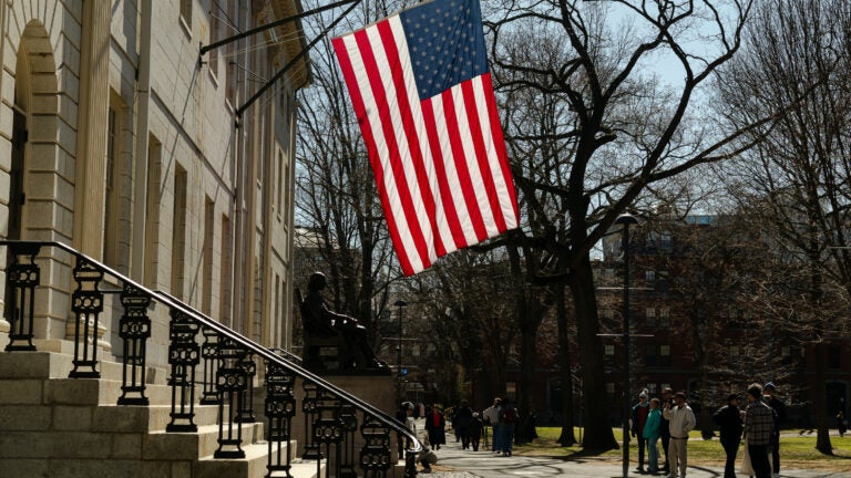 What is tax-exempt status and can the IRS revoke it from Harvard?