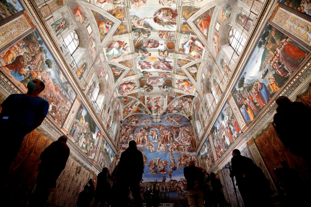 Vatican firefighters install a chimney on the roof of the Sistine Chapel for the papal election – Chicago Tribune