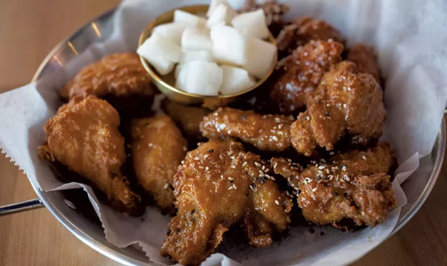 Chicken wings with pickled daikon radish - DARIA BISHOP