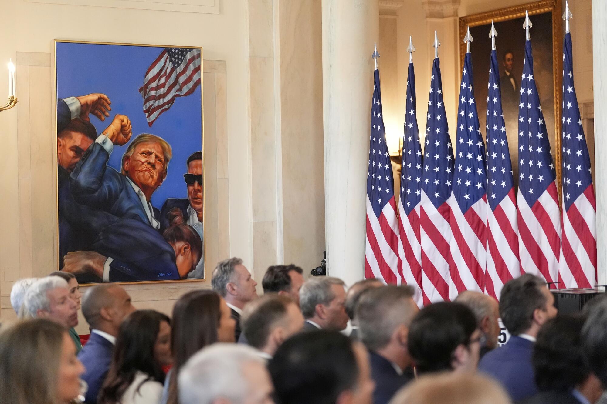 A painting of President Donald Trump is seen in the Grand Foyer.