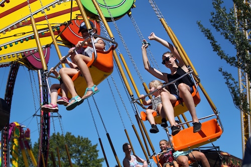 Fairgoers on a ride at the Washington County Fair