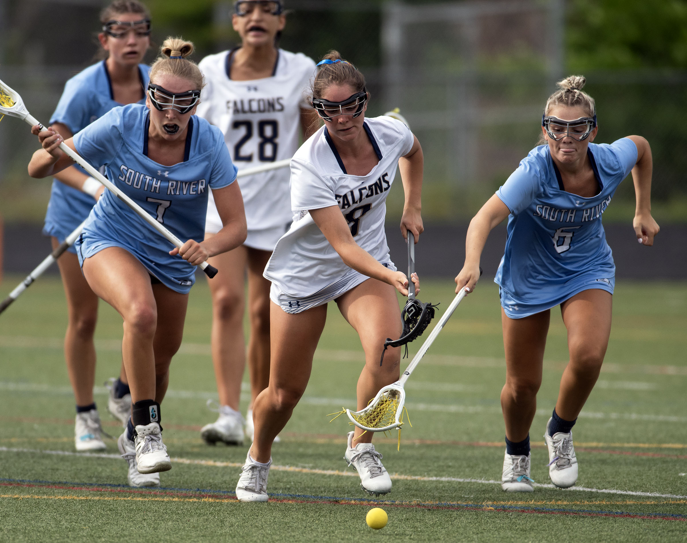 May 12, 2025- Severna Park’s Bella Mazzola, center, chases the...