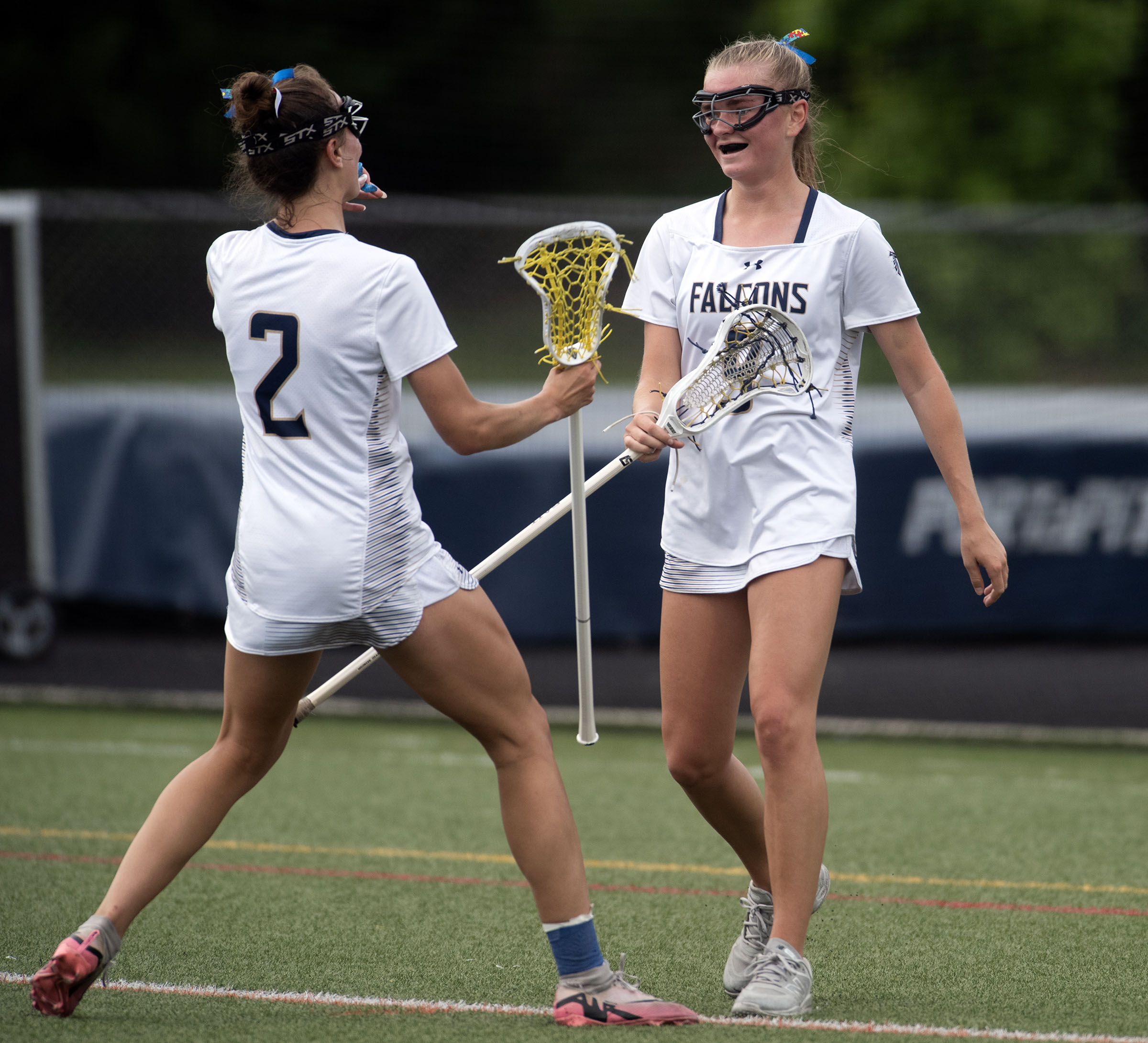 May 12, 2025- Severna Park’s Ava Deegan, right, and Erin...