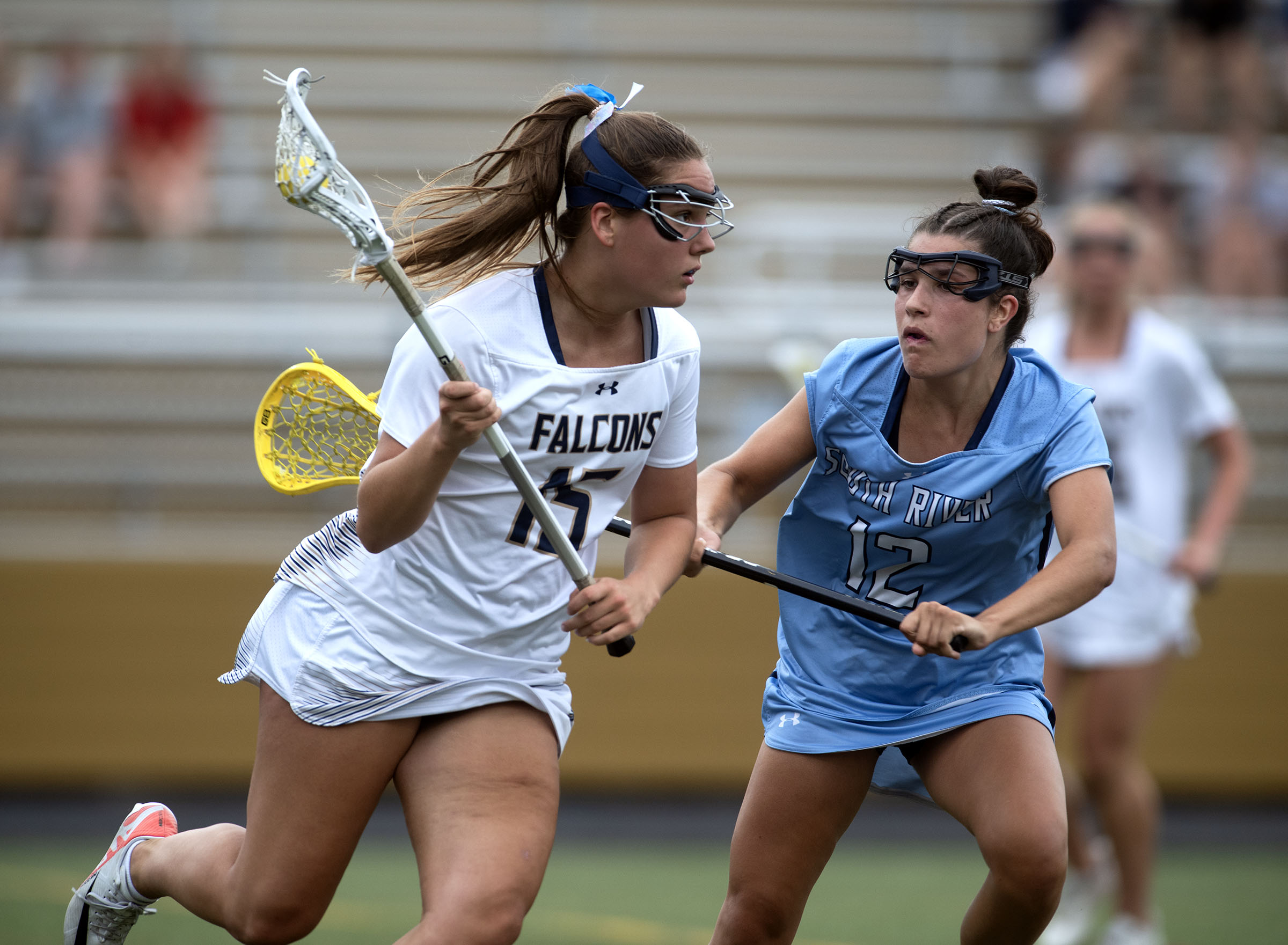 May 12, 2025- Severna Park’s Molly Koistinen, left, tries to...