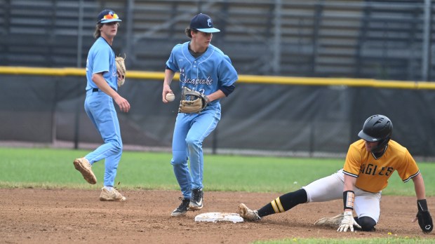 Chesapeake’s Lance Blair forces out Northeast’s Rodney Sterry at second...