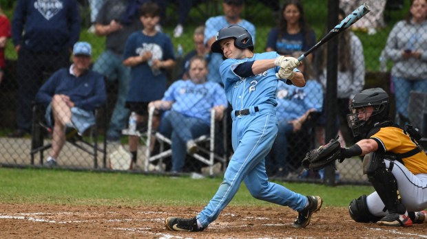 Chesapeake’s CJ Aug. connects with a 2-run double against Northeast...