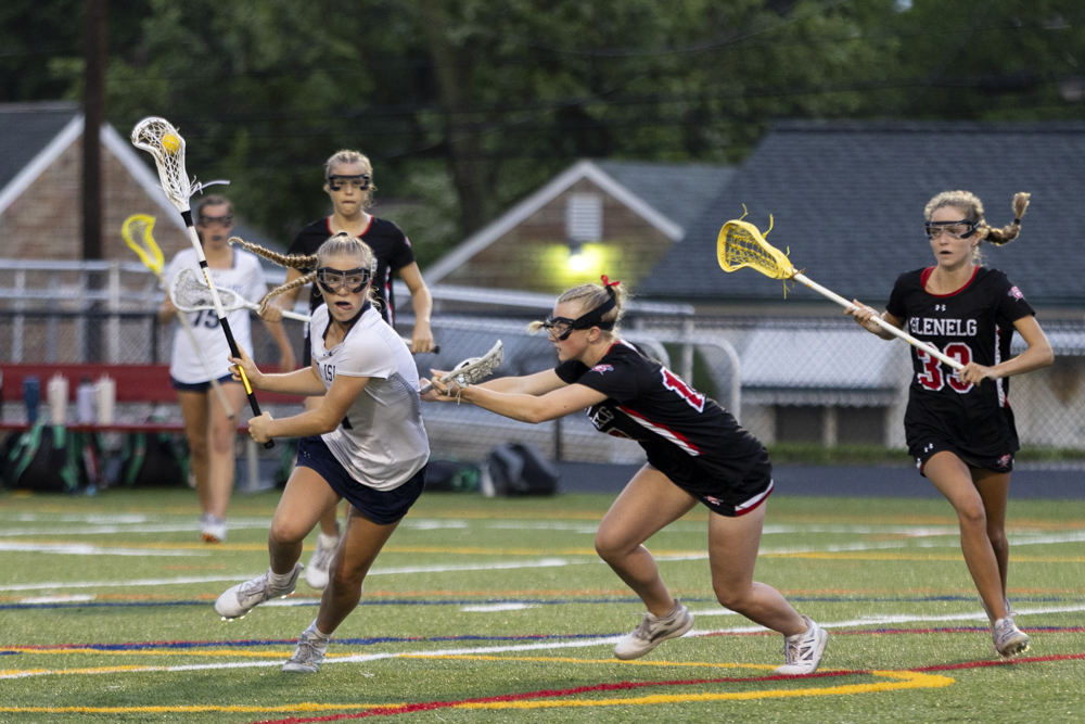 Kent Island’s Hailey Offutt pushes through the Glenelg defense during...