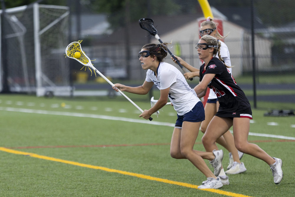 Kent Island’s Willow Yost carries the ball during the state...